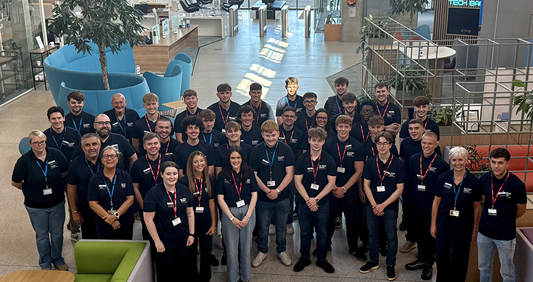 Group of apprentices in the atrium at Scottish Water's HQ The Bridge in Stepps