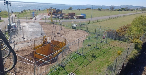 a construction site with a fence