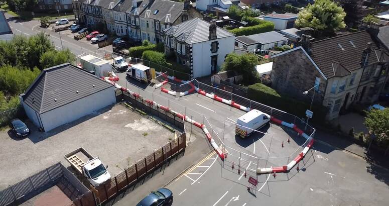 Drone footage of road closed off with heras fencing on Greenhill Road