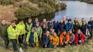 The team of volunteers who helped plant native trees at Knowes Dean Reservoir
