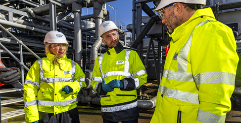 Cabinet Secretary for Climate Action and Energy Gillian Martin MSP and Ben Macpherson MSP are shown in discussion with Professor Simon Parsons during a visit to Seafield Waste Water Treatment Works