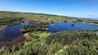 Drone shot of North Third Reservoir on sunny clear blue sky day