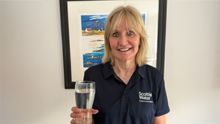 Scottish Water Chair Deirdre Michie raising a pint of water ahead of World Cup