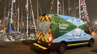 A Scottish Water van in front of the Tall Ships at Aberdeen Harbour