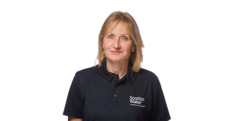 head and shoulders of Scottish Water chair Deirdre Michie in blue polo shirt