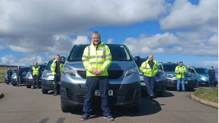 Some of the Orkney Water Treatment Team with the new electric vehicles