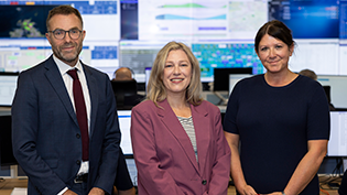 Acting Cabinet Secretary for Net Zero and Energy Gillian Martin centre with Scottish Water's director Professor Simon Parsons and Sharon Hamilton Manager of the Intelligent Control Centre at The Bridge, Stepps