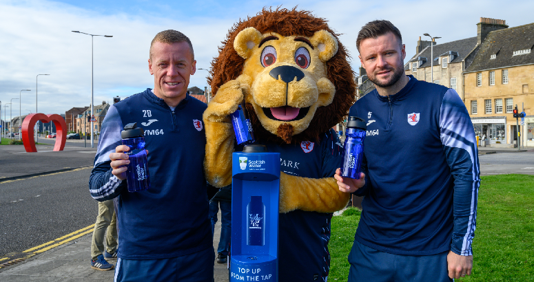 Raith Rovers players and Mascot at new tap