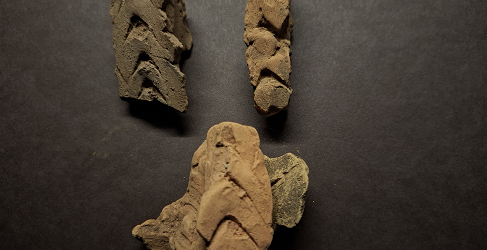 Decorated clay daub from wall of one of the roundhouses