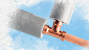 showing t-junction copper pipes with insulation